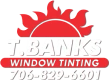 A logo for "T. Banks Window Tinting" featuring a red stylized sun above bold white text. Below, a red banner displays "Window Tinting," followed by the phone number "706-829-6601" in white text.